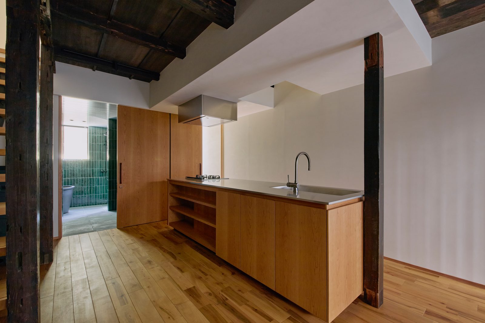 Kitchen with open doors to bathroom