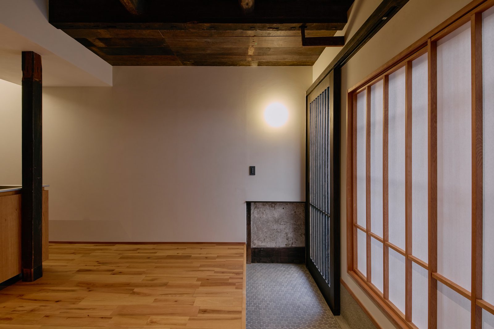 Soot-darkened cedar ceiling beams