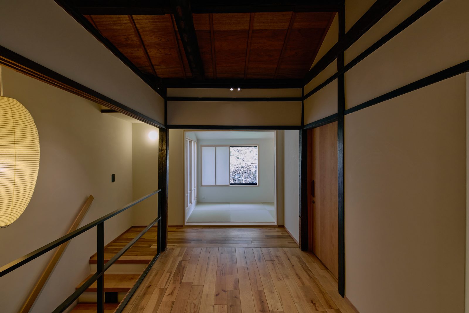 Kitchen wide view with floating staircase