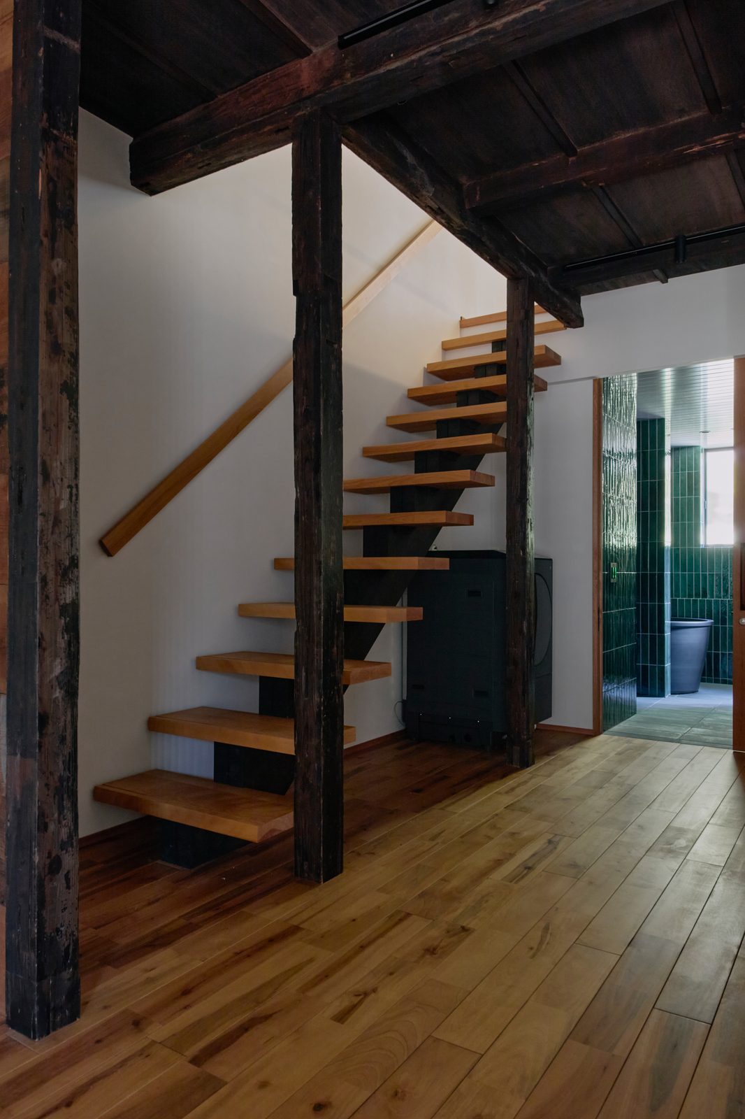 Stairwell from above with cypress and steel