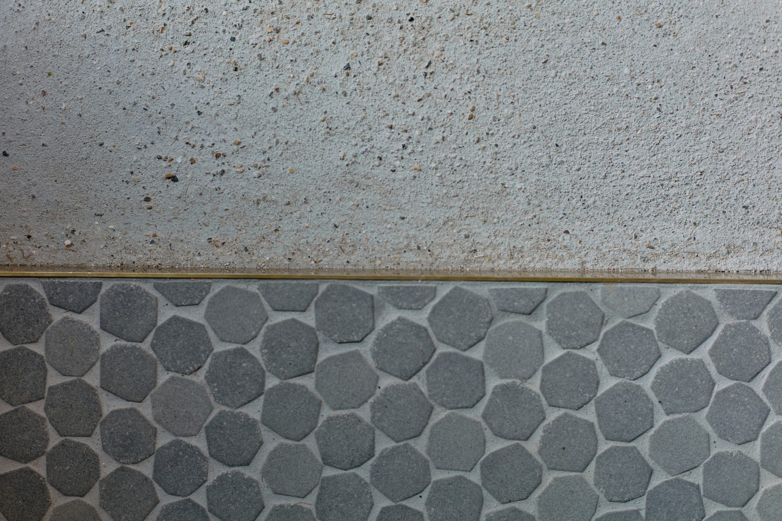 Entry floor tiles in hexagonal pattern