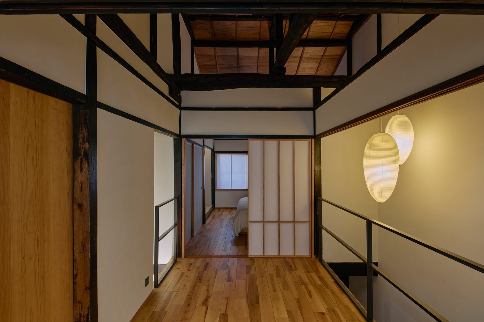 Second floor washroom framed by original timber posts