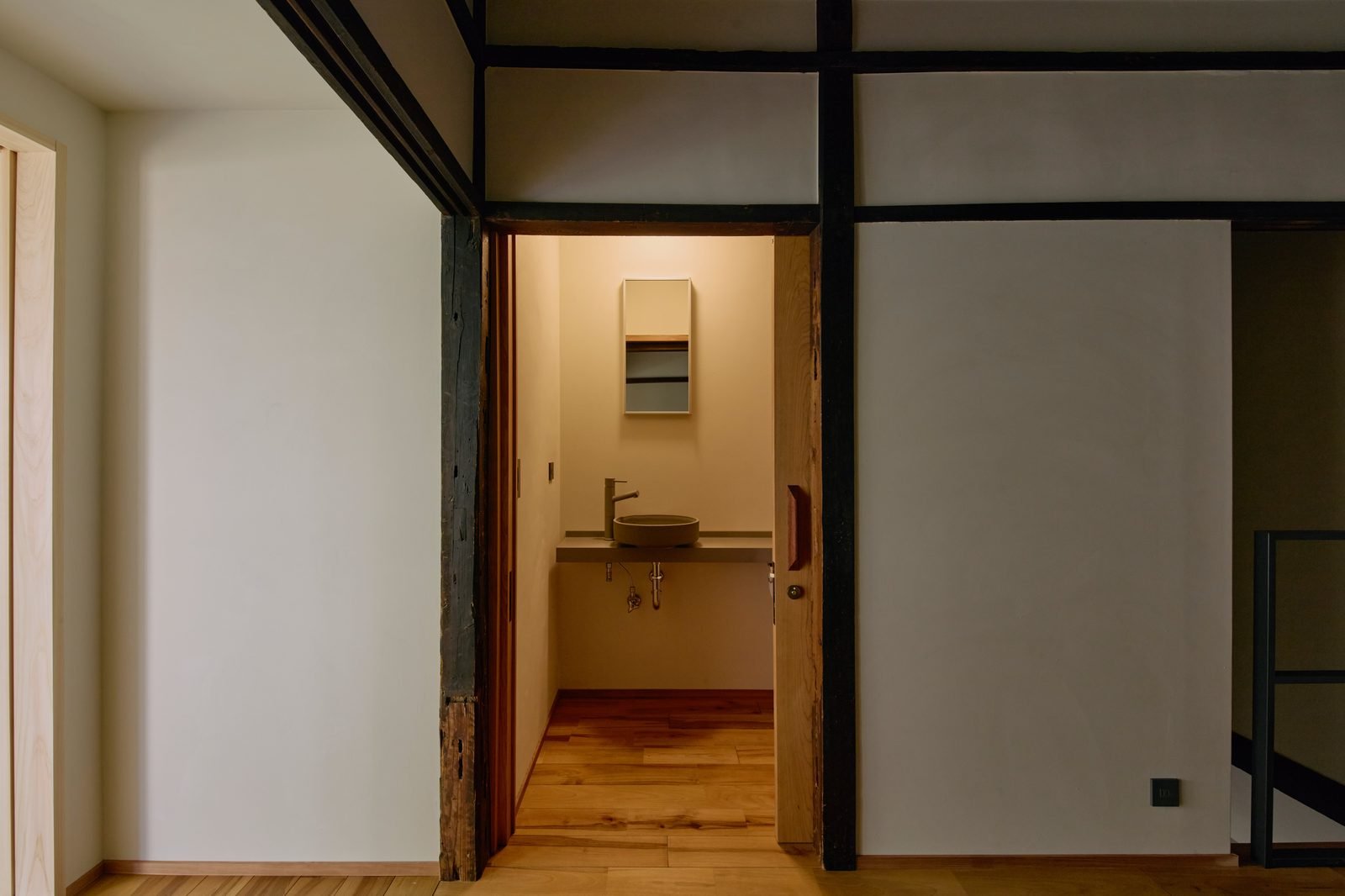 Shōji screens filtering light into tatami room